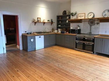 Sanded and sealed pine boards in a kitchen