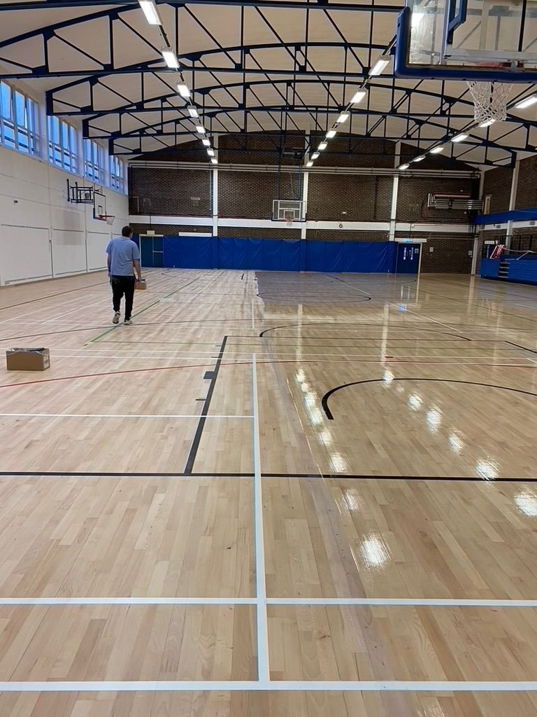 Resealed sports hall floor with court lines