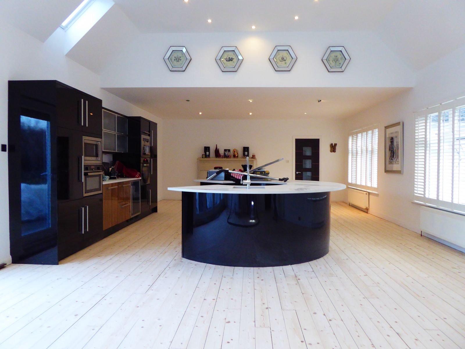 Light finished boards in an open-plan kitchen