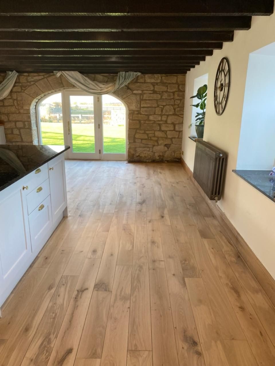 Sanded and sealed oak floor in a farmhouse kitchen